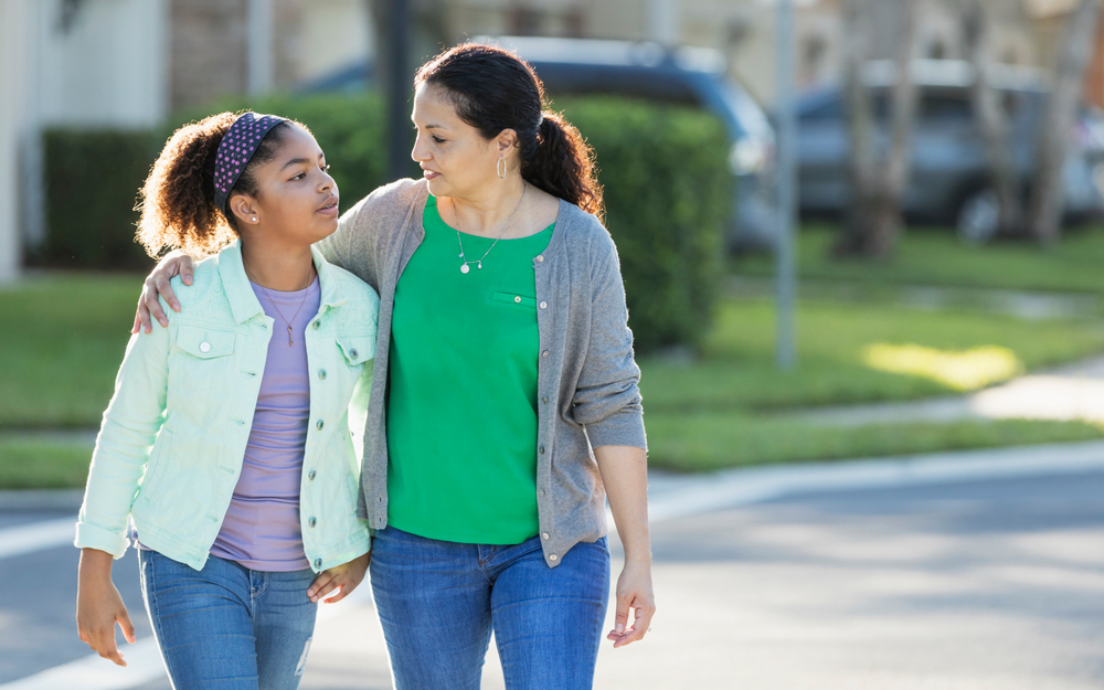 A mother talks to her adolescent daughter about seeing a gynecologist.