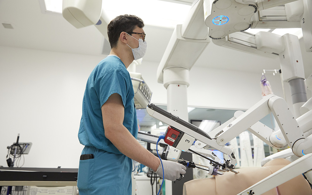 Surgeon using robotic tool