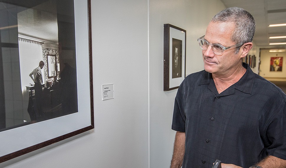 Devik Wiener views Leigh Wiener's works in place during a tour at Cedars-Sinai.