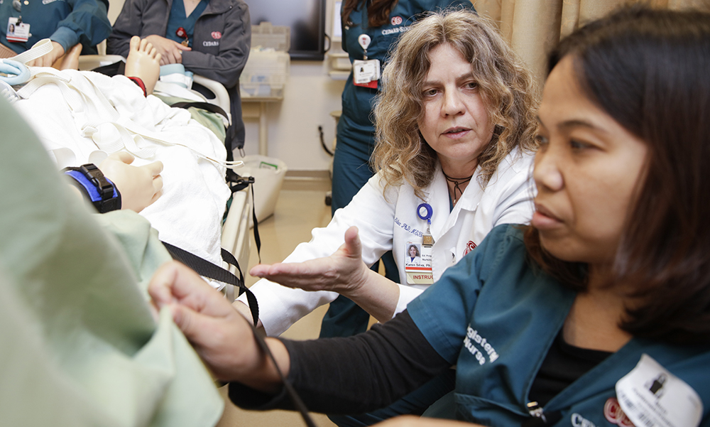 Cedars-Sinai education program coordinator, Karen Silva teaching a nurse