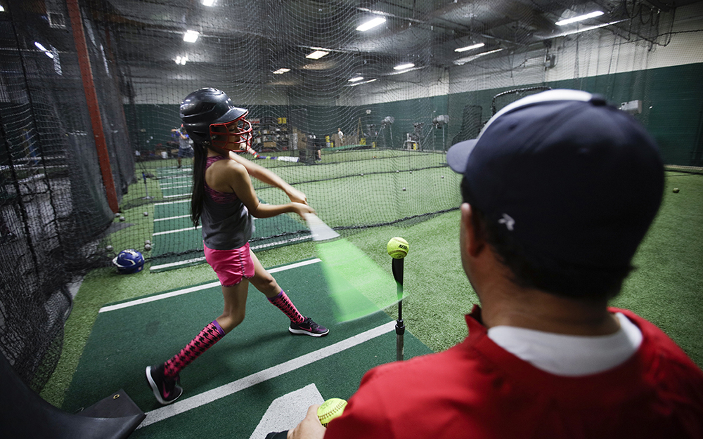 Serena Melvin in a batting cage.