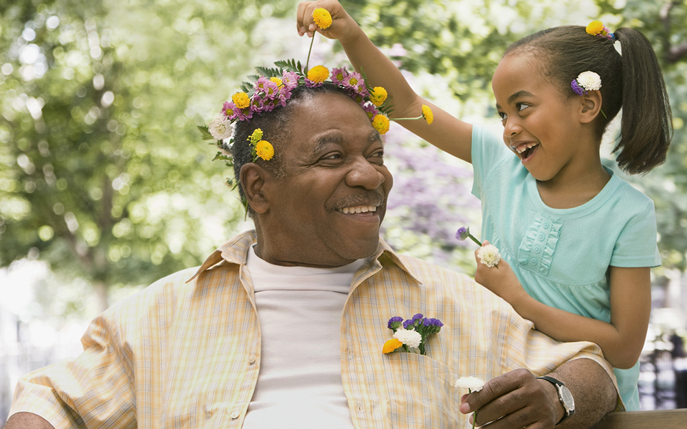 Elderly man with his granddaughter.