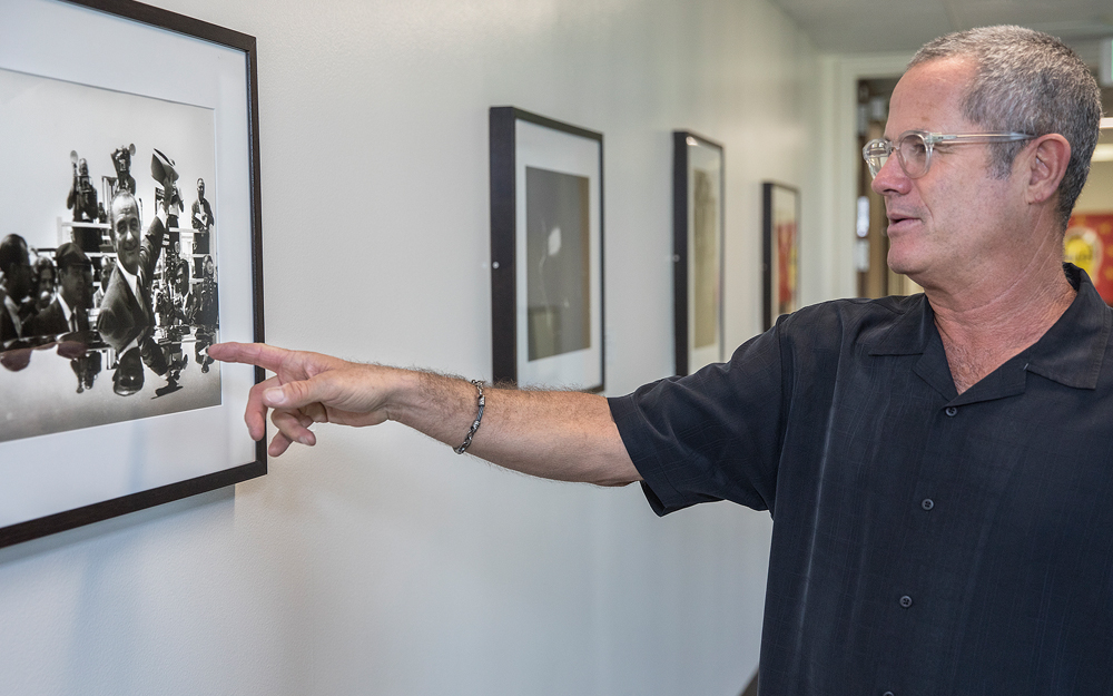 Leigh Wiener displaying his art photos