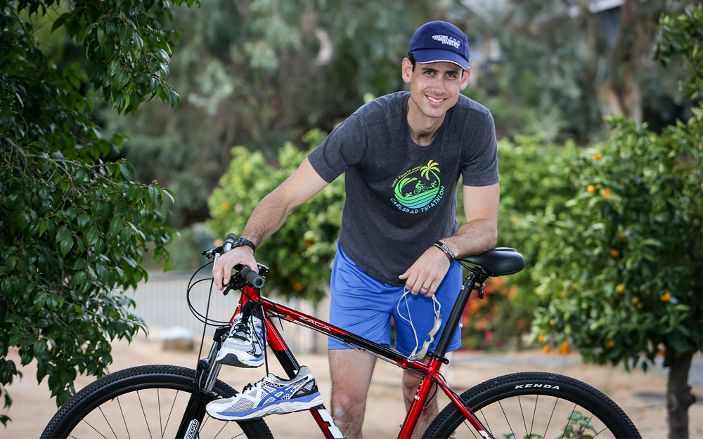 Cedars-Sinai heart surgery patient, Mike Peck on the bike trail.