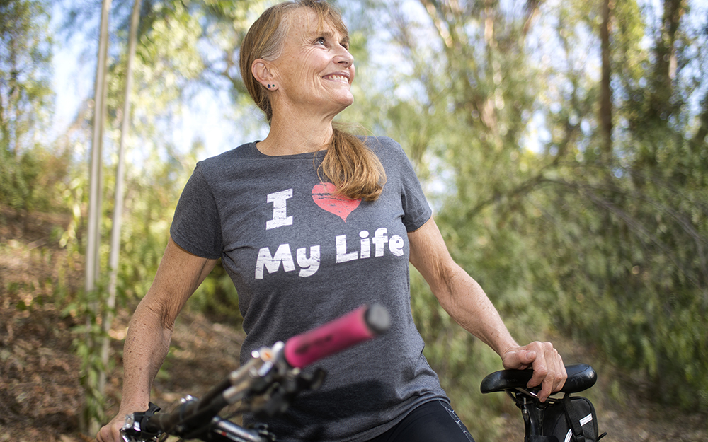 Jacqueline Stanford mountain biking after her knee replacement surgery.