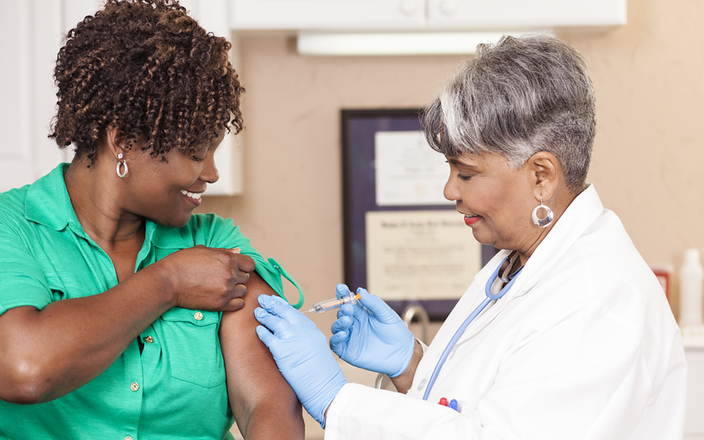 Woman getting a flu shot.