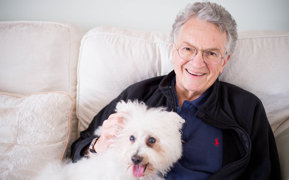 Jim Calio after his triple bypass procedure with his dog Samantha.