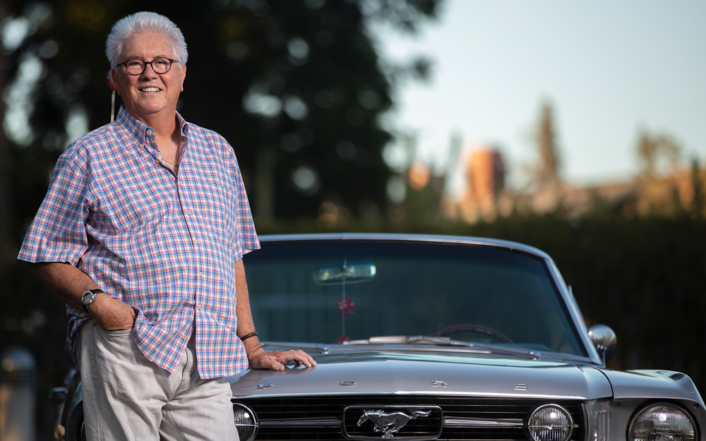Idiopathic pulmonary fibrosis (IPF) patient Paul Giordano standing next to his classic car.