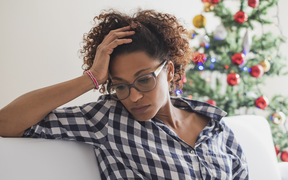 A woman going through stress and depression during holidays