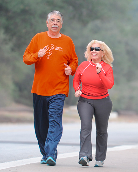 Active Surveillance patient Charles Trevino running at the Rose Bowl with is wife.