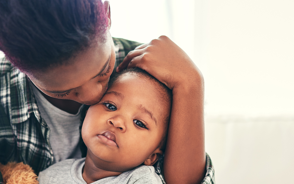 A black mother with her newborn child. 