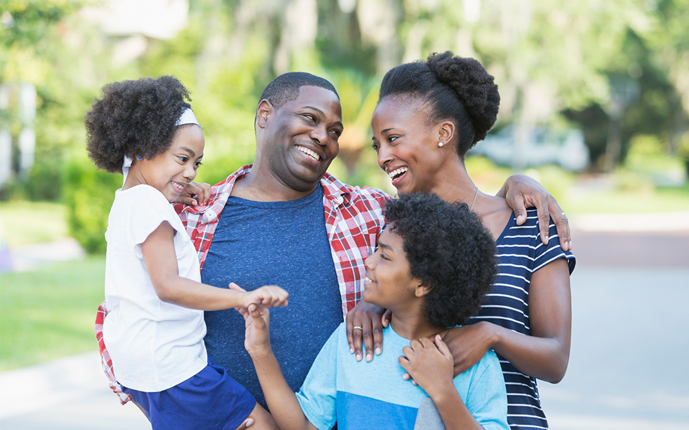 An African American family of four.