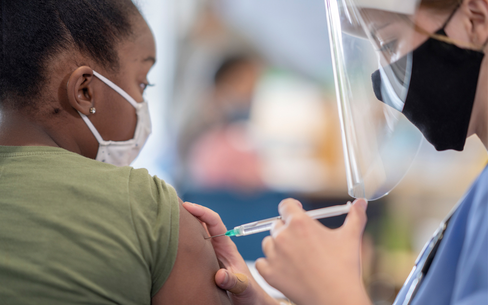 Child getting vaccinated.