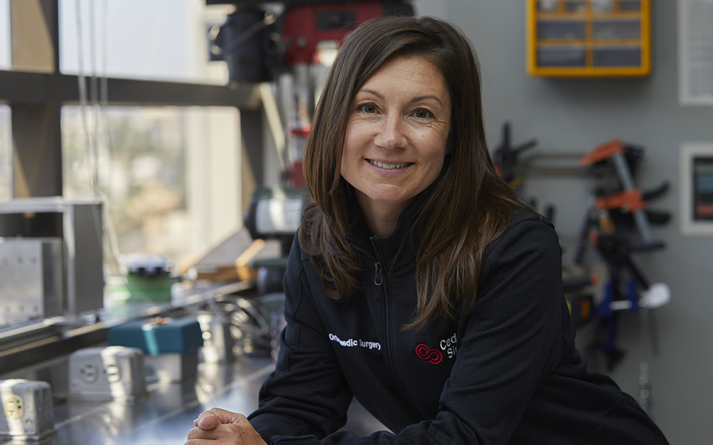 Melodie F. Metzger, PhD inside a lab.