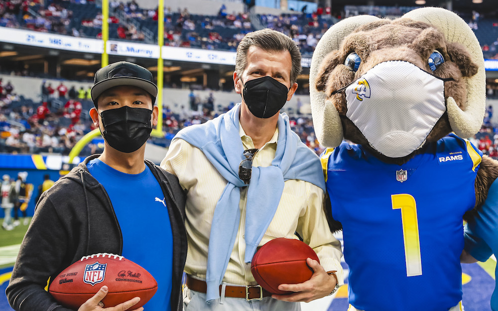 Michael Hausknost and Larry Pangestu, a phlebotomist at  Cedars-Sinai Donor Services with Los Angeles Rams' mascot.