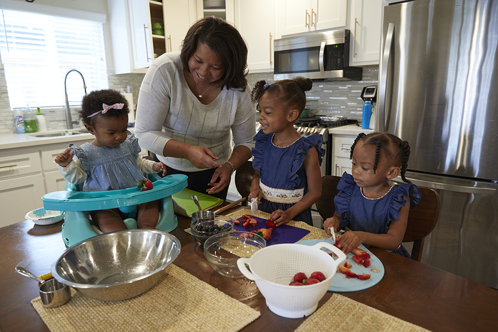 Premere Sessions with her two daughters.