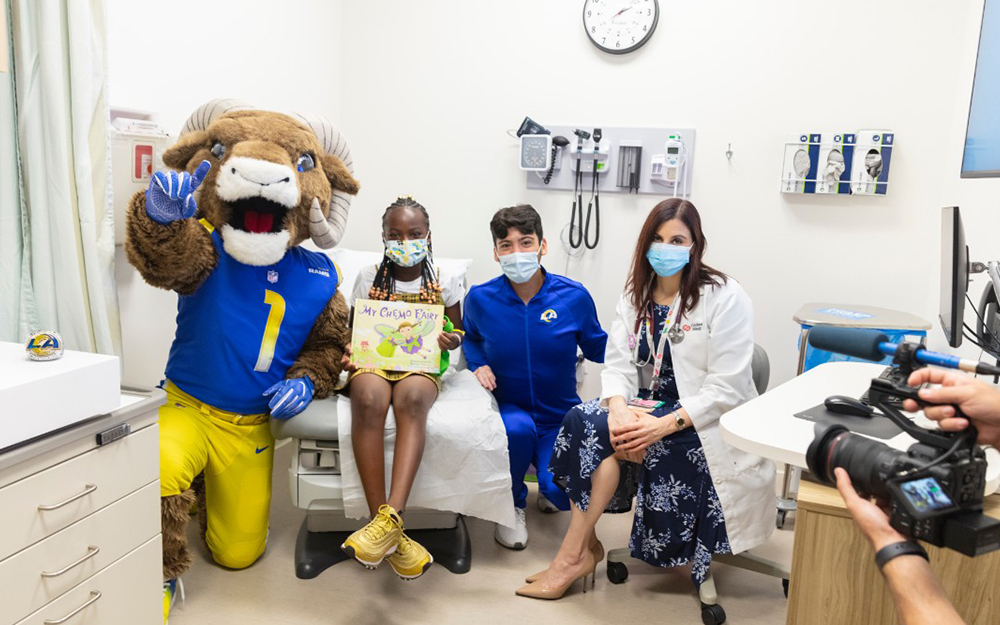 Leukemia patient Victoria Coats received a personal hospital visit from the Los Angeles Rams’ mascot, Rampage, in October 2022.