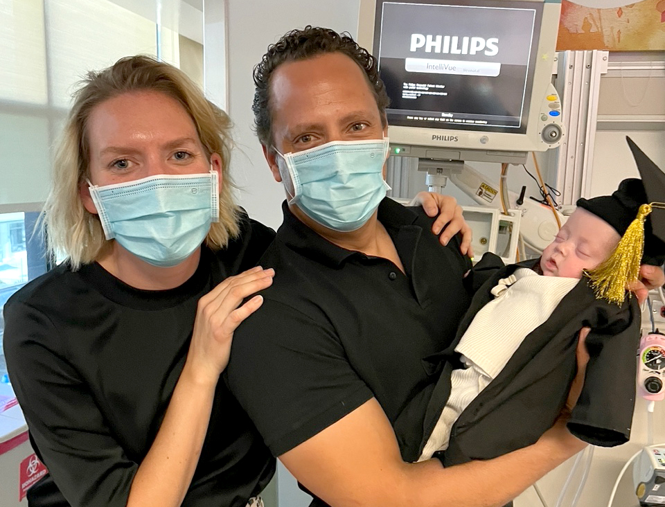 Fransiska Weckesser, Michael Douglas and baby Bliss on NICU graduation day.