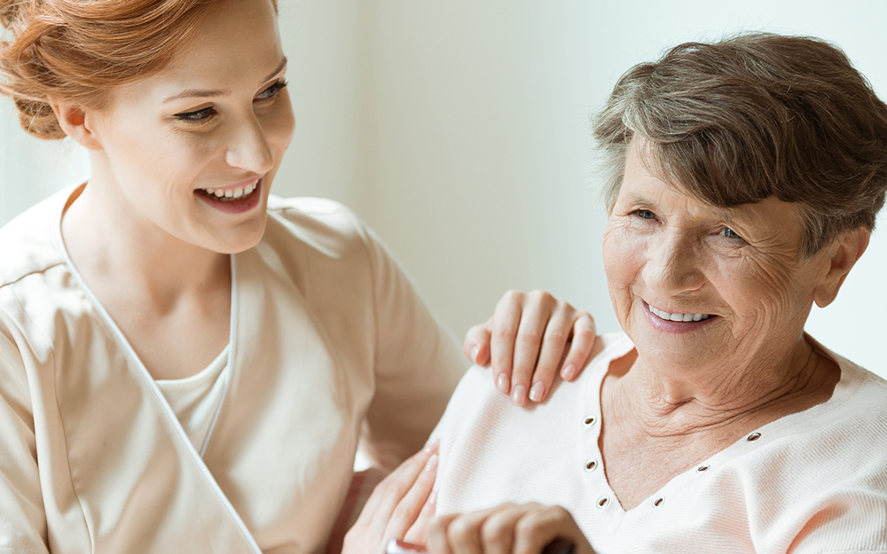 A granddaughter working as a nurse and taking care of her disabled grandmother.