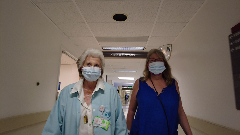 Ruthie Krivis walking with patient.