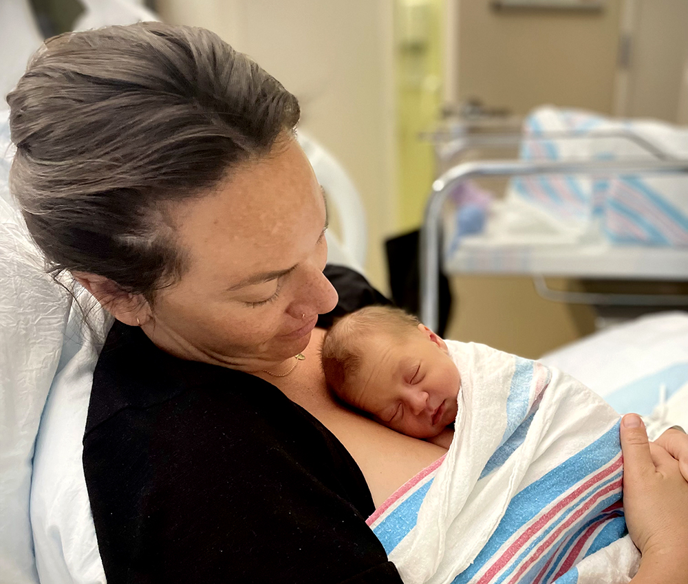 Erin Laber just after childbirth with baby Norah.