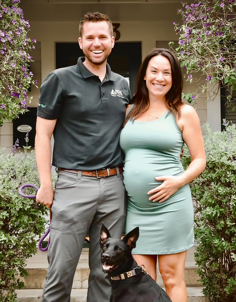 Erin Laber with her husband and dog.