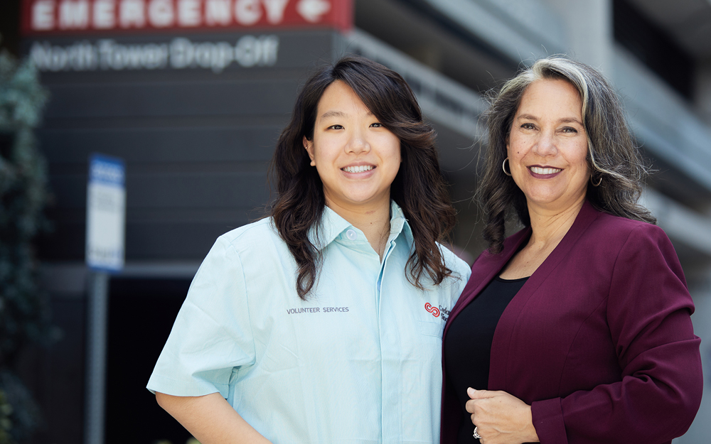 Cedars-Sinai volunteer director Michele Prince with TLC volunteer, Audrey Lam.