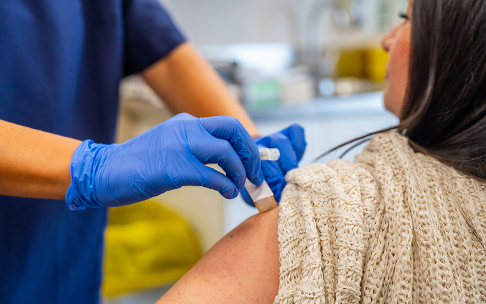 Woman getting a vaccine