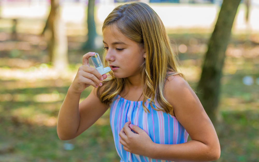 Little girl having respiratory problems