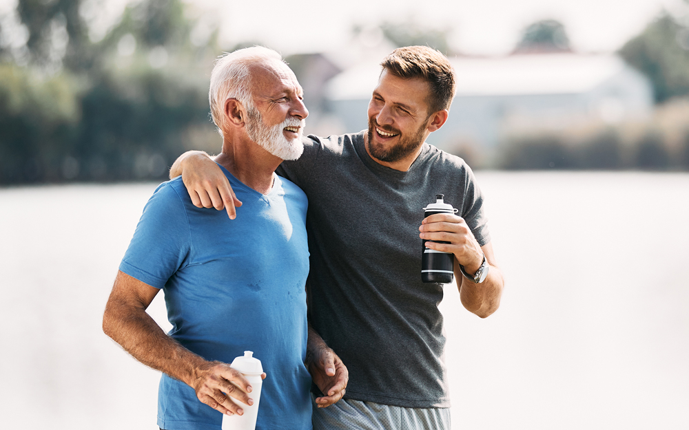 Father and son talking after exercising