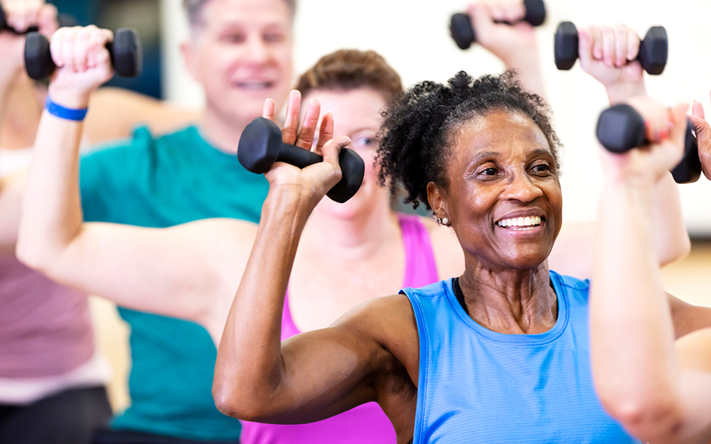 Seniors exercising with weights