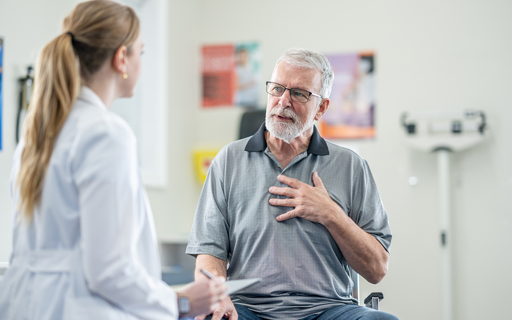 Man speaking with his doctor