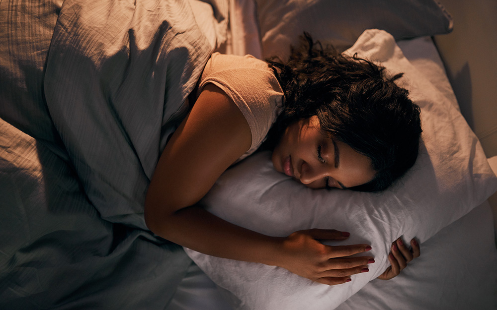 Woman sleeping in bed