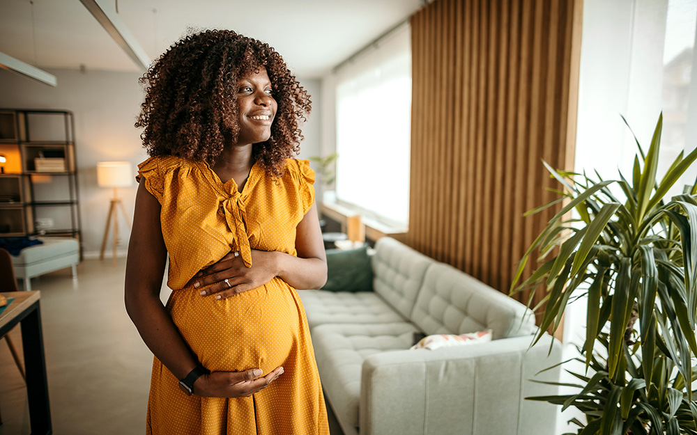 Beautiful woman in pregnant at home