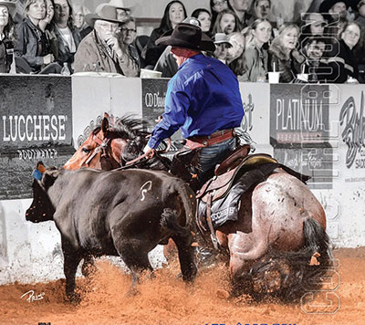 Lance Johnston in a reined cow horse event.