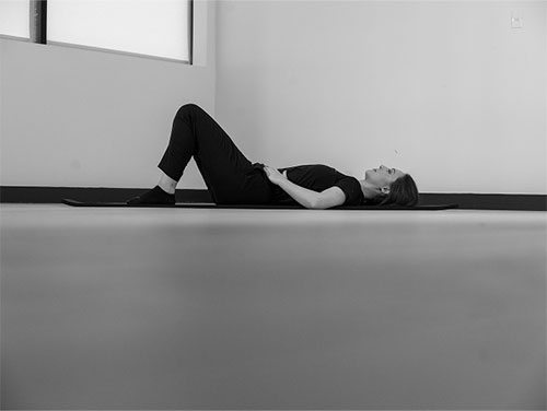 Woman lying on the floor.