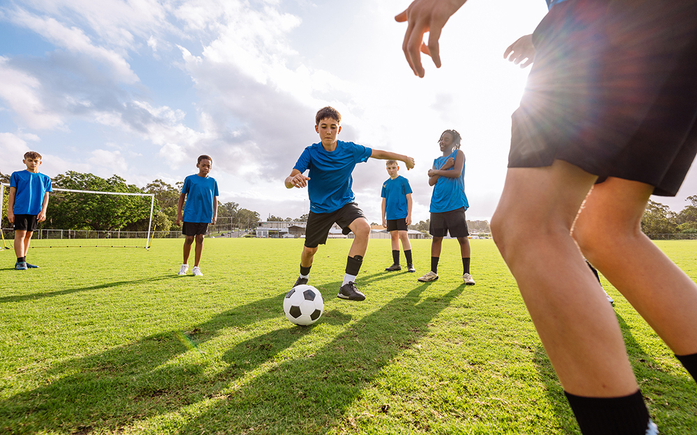 Boys playing soccer.