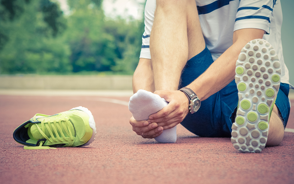Runner holding his foot.