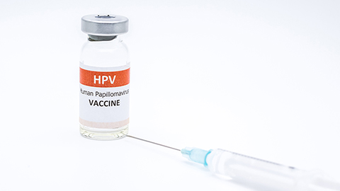 HPV vaccine anad syringe