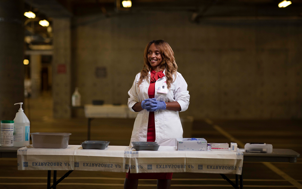 Nurse Gena Smith-Woods at a Cedars-Sinai COVID-19 vaccination station.