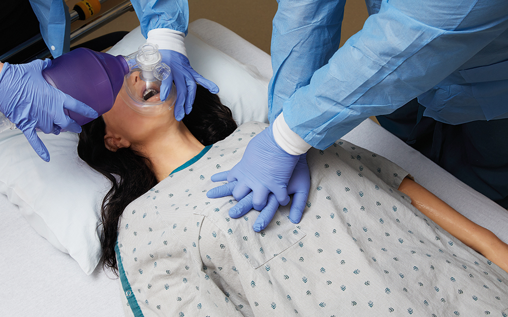 Female mannequin being used for CPR training