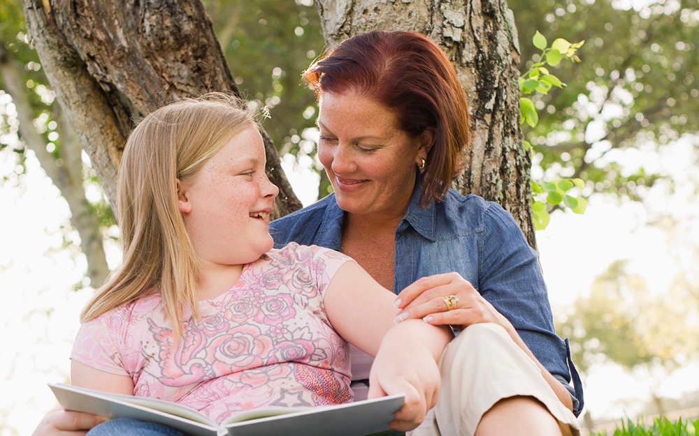 Mother and daughter reading