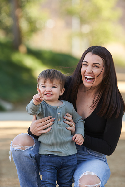 Marci Tatham and her son Jack play together in park after his diagnosis of the rare genetic disease, Klinefelter syndrome.