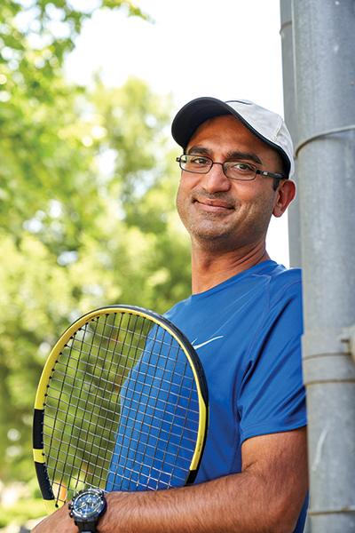 Mehul A. Thakkar, MD, at a tennis court.