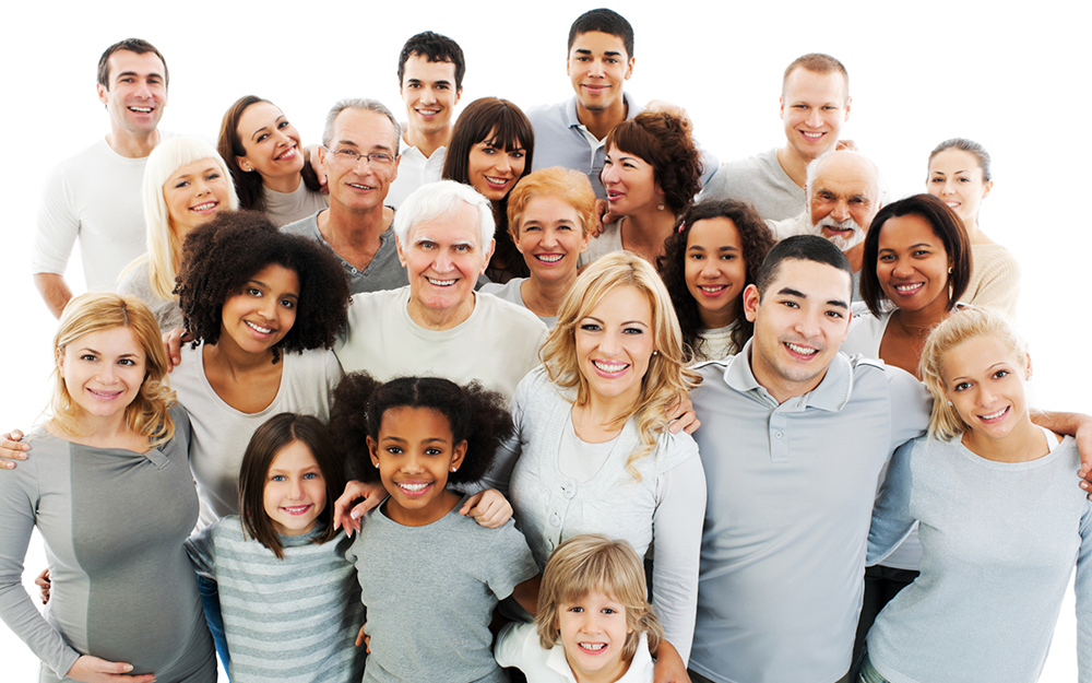 Portrait of a diversity Mixed Age and Multi-generation Family embracing and standing together. 