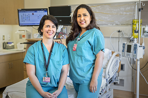 Two Cedars-Sinai Nurses smiling
