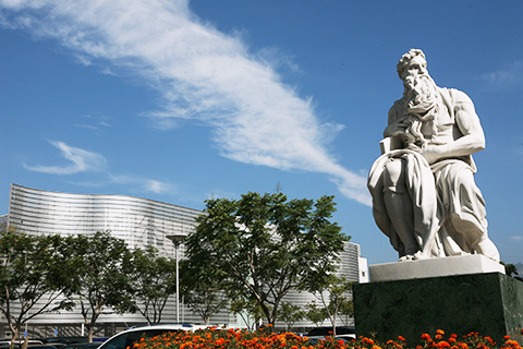City building and Greek Statue