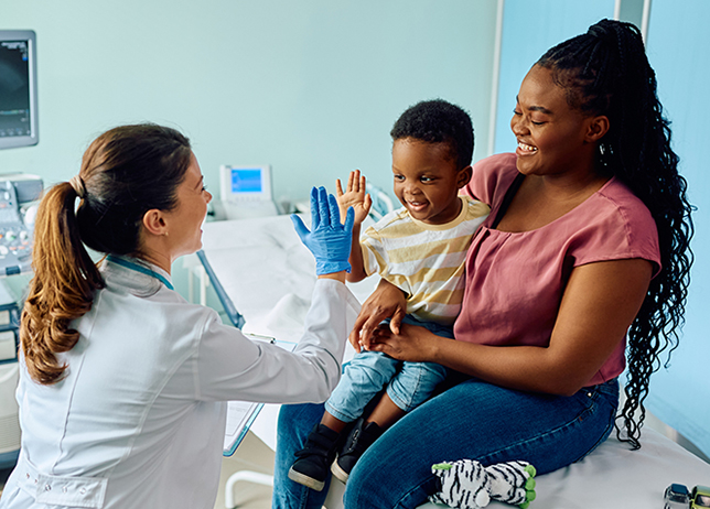Dermatologist With Patient