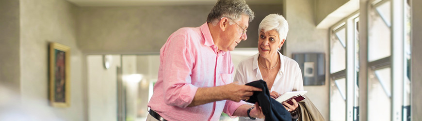 man and woman reviewing paperwork