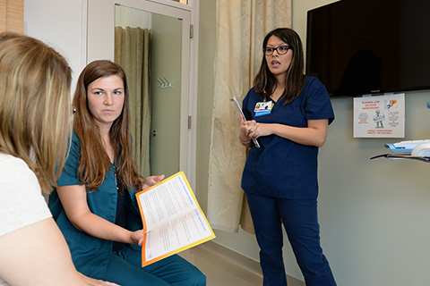 Rachel Hieronimczak, RN, BSN, left, and Clinical Care Associate Stephanie Urias help coordinate Tysabri infusions for patients at the Cedars-Sinai Multiple Sclerosis Center.